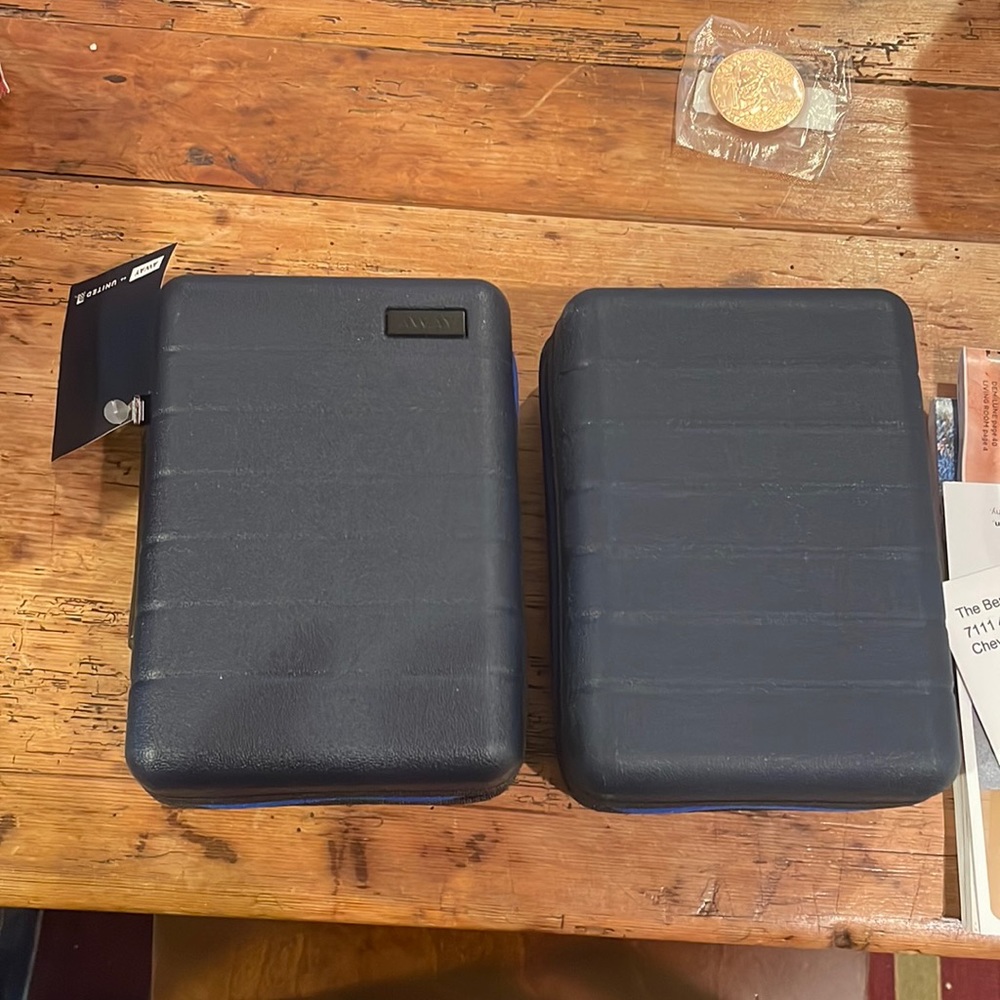 Two Unitex X Away toiletry bag